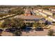 Charming exterior of a multi-Gathering townhome, accented by mature trees and well-kept landscaping at 13228 Daniels Landing Cir, Winter Garden, FL 34787