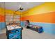 Garage with air hockey and arcade game at 571 Drop Shot Dr, Davenport, FL 33896