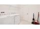 Laundry room with washer, dryer, and storage at 571 Drop Shot Dr, Davenport, FL 33896