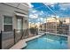 Private pool and spa with safety fence at 571 Drop Shot Dr, Davenport, FL 33896