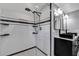 Modern bathroom with subway tile, double vanity, and large shower at 728 Palm Dr, Orlando, FL 32803