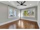 Bright bedroom with hardwood floors and large windows at 728 Palm Dr, Orlando, FL 32803