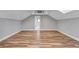 Spacious bonus room with hardwood flooring and plenty of natural light at 728 Palm Dr, Orlando, FL 32803