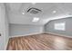 Bright bonus room featuring hardwood floors and neutral walls at 728 Palm Dr, Orlando, FL 32803