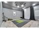 Indoor golf simulator room with artificial turf and projector at 728 Palm Dr, Orlando, FL 32803