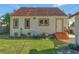 Charming house exterior with terracotta roof and well-manicured lawn at 728 Palm Dr, Orlando, FL 32803