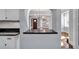 Kitchen with a breakfast bar overlooking the dining room at 728 Palm Dr, Orlando, FL 32803