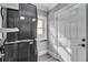 Laundry room with stacked washer and dryer, and window at 728 Palm Dr, Orlando, FL 32803