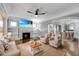 Spacious living room featuring a fireplace and hardwood floors at 728 Palm Dr, Orlando, FL 32803