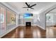Bright living room with hardwood floors and a fireplace at 728 Palm Dr, Orlando, FL 32803