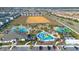 Community pool with water slides and a clubhouse at 1179 Kingsbarn St, Davenport, FL 33896