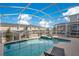 Private pool and spa with screened enclosure at 1179 Kingsbarn St, Davenport, FL 33896