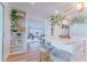 Open-concept kitchen with island, bar stool seating, and seamless transition to living space at 136 Reef Rd, South Daytona, FL 32119
