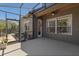 Open patio gives a view of the screened-in pool and lush greenery at 1912 Westover Reserve Blvd, Windermere, FL 34786
