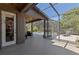 Expansive patio with a screened-in pool offers seamless indoor/outdoor living at 1912 Westover Reserve Blvd, Windermere, FL 34786