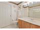 Bathroom featuring a vanity with wood cabinets, a toilet, and a shower at 1912 Westover Reserve Blvd, Windermere, FL 34786