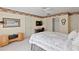 Comfortable bedroom features a ceiling fan, artwork and trim detail at 1912 Westover Reserve Blvd, Windermere, FL 34786