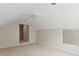 Attic bonus room features a ceiling fan, a partial mirror and carpet flooring at 1912 Westover Reserve Blvd, Windermere, FL 34786