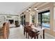 Elegant dining room featuring a chandelier and views of the pool at 1912 Westover Reserve Blvd, Windermere, FL 34786