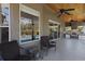 Relaxing covered patio featuring an outdoor kitchen and views of the sparkling pool at 1912 Westover Reserve Blvd, Windermere, FL 34786