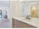 Modern bathroom featuring a sink with drawers and a mirror reflecting the glass enclosed shower at 2161 Sharon Rd, Winter Park, FL 32789