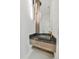 Stylish powder room with modern fixtures, designer mirror, and sleek floating vanity at 2161 Sharon Rd, Winter Park, FL 32789
