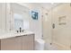 Modern bathroom featuring a sink, toilet, and glass enclosed shower at 2161 Sharon Rd, Winter Park, FL 32789