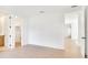 Bedroom with hardwood floors and doorways leading to the bathroom and closet at 2161 Sharon Rd, Winter Park, FL 32789