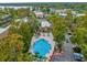 Aerial view showcasing the community pool, spa, and landscaping at 4008 Versailles Dr # 4008C, Orlando, FL 32808