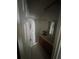 Bathroom showcasing a shower with curtain, vanity, and mirror at 4008 Versailles Dr # 4008C, Orlando, FL 32808