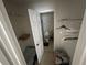 Walk-in closet leading into the bathroom at 4008 Versailles Dr # 4008C, Orlando, FL 32808