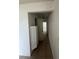 Hallway with tile flooring leading to multiple rooms at 4008 Versailles Dr # 4008C, Orlando, FL 32808