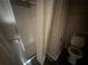 This bathroom features a shower and a toilet at 4121 Dijon Dr # 4121H, Orlando, FL 32808