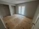 Bright bedroom with closet space, access to outdoor balcony, and fresh flooring at 4121 Dijon Dr # 4121H, Orlando, FL 32808