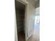 In-unit storage closet with shelving, offering convenient organizational opportunities near the living space at 4121 Dijon Dr # 4121H, Orlando, FL 32808