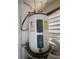 Close-up of the home's water heater at 4121 Dijon Dr # 4121H, Orlando, FL 32808