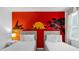 Charming bedroom featuring two twin beds and a vibrant Lion King themed mural on the wall at 4501 Monado Dr, Kissimmee, FL 34746