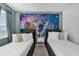 Charming bedroom featuring two twin beds and a colorful mural of Disney's Frozen characters at 4501 Monado Dr, Kissimmee, FL 34746