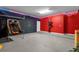 Bright and colorful game room with basketball hoops and neon lighting offering a fun recreational space at 4501 Monado Dr, Kissimmee, FL 34746