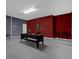 Basement with painted accent wall and pool table at 4571 Cabello Loop, Kissimmee, FL 34746