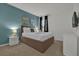 Comfortable bedroom featuring a queen-size bed, black curtains, and a carpeted floor at 4571 Cabello Loop, Kissimmee, FL 34746