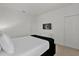 Bright, airy bedroom with a large bed, closet, and a wall-mounted TV for relaxed viewing at 4571 Cabello Loop, Kissimmee, FL 34746
