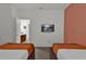 Comfortable bedroom featuring two twin beds, perfect for relaxing at 4571 Cabello Loop, Kissimmee, FL 34746