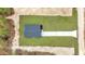 Aerial view of well-maintained backyard with a new home and a long driveway at 12220 Sw 76Th Ln, Dunnellon, FL 34432