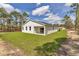 New construction featuring a well-manicured lawn and a private backyard at 12386 Sw 89Th St, Dunnellon, FL 34432