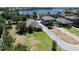 An aerial view of the home showing the generous yard and nearby lake at 15531 Waterleigh Cove Dr, Winter Garden, FL 34787