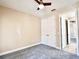 Cozy bedroom with neutral walls, carpet, and ceiling fan at 15531 Waterleigh Cove Dr, Winter Garden, FL 34787