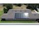 Aerial view of roof with solar panels, showing an environmentally conscious home upgrade at 15531 Waterleigh Cove Dr, Winter Garden, FL 34787