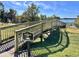 Waterfront pier offering access and scenic views of the tranquil lake at 15531 Waterleigh Cove Dr, Winter Garden, FL 34787