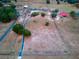 Aerial view of house and surrounding land at 22711 State Road 44, Eustis, FL 32736